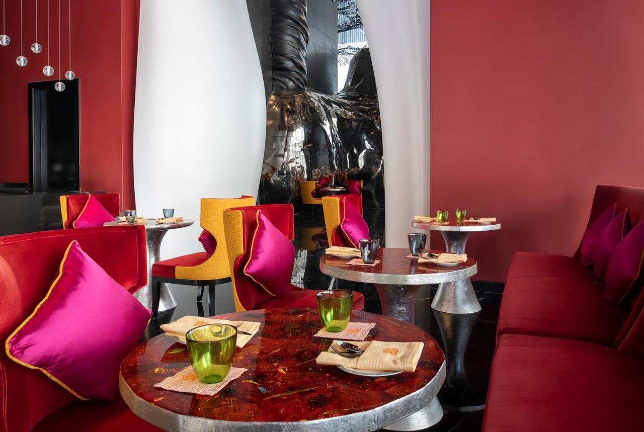 บันยันทรี โดฮา แอท ลา ซิกาล มูไชเรบ Hotel ภายนอก รูปภาพ The interior of the restaurant