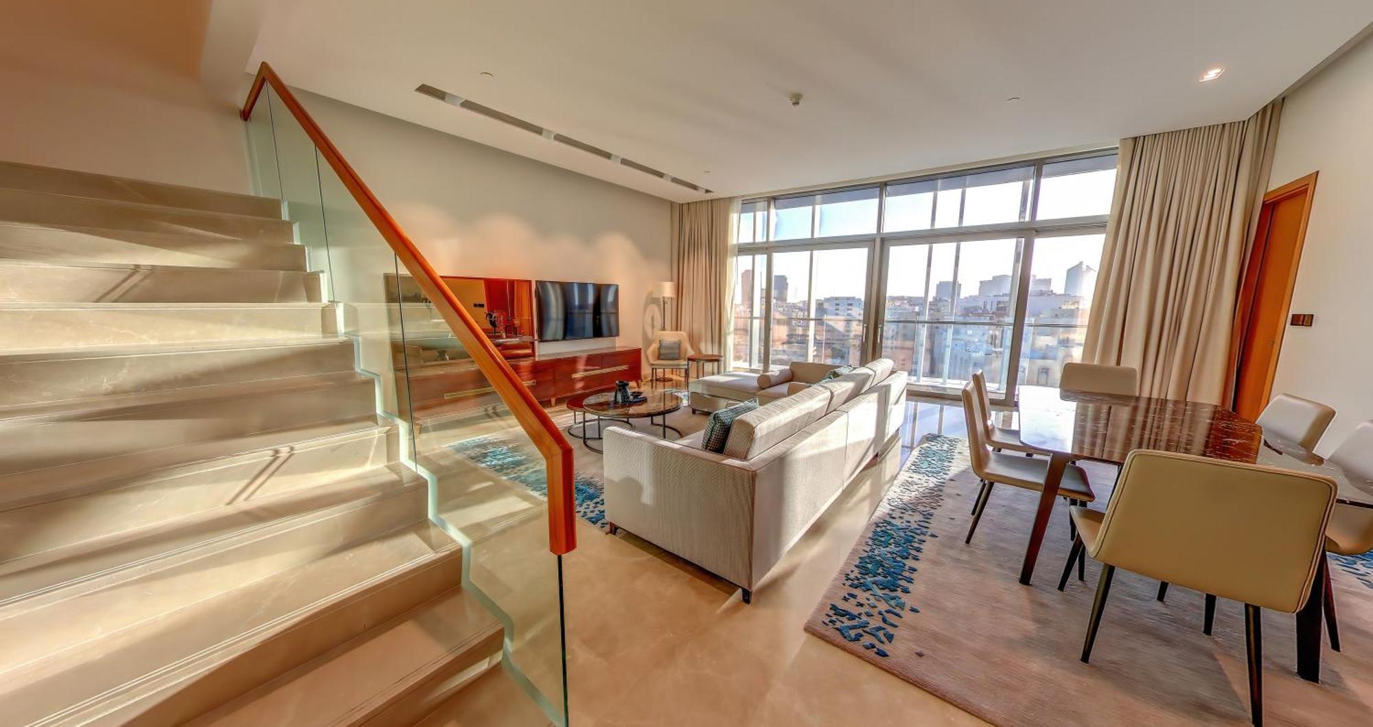 บันยันทรี โดฮา แอท ลา ซิกาล มูไชเรบ Hotel ภายนอก รูปภาพ A living room in a typical apartment